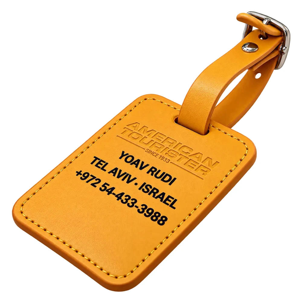 תג מזוודה American Tourister בצבע כתום פפאיה עם חריטת שם בלייזר